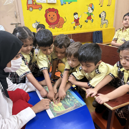 Rainbow School students learning with care